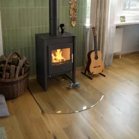 Sklo pod kamna - FLAMINGO Oblouk 1000x1200 mm, fazeta / R725 / 6 mm HS Flamingo Sklo pod kamna - FLAMINGO Oblouk 1000x1200 mm, fazeta / R725 / 6 mm HS Flamingo